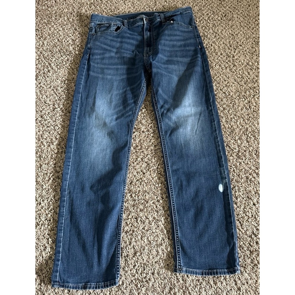 Calvin Klein Men's Slim Straight fit Blue Jeans some bleach spots Size 34x30